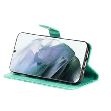 Load image into Gallery viewer, Casekis Embossed Butterfly Wallet Phone Case Green
